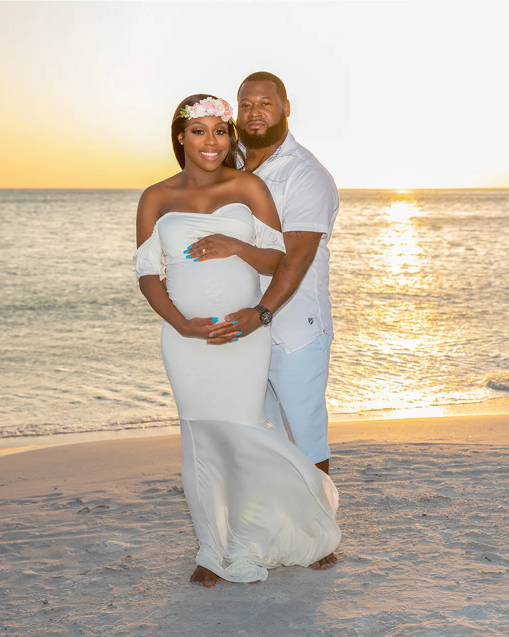Beach maternity photography Tampa orange sunset gown
